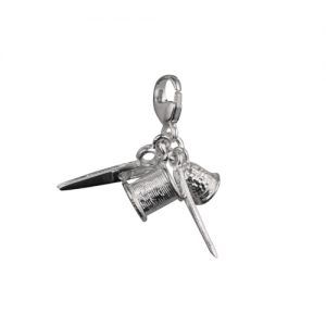 Four Silver 15x4mm seamstress's Charms on a lobster trigger